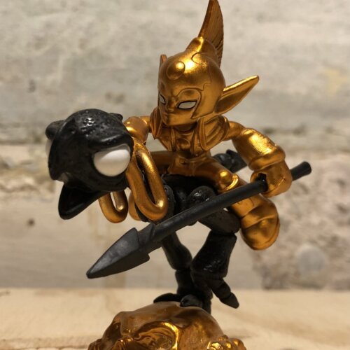 Halloween Fright Rider. Golden character holding a spear riding blackened war-chicken bones.